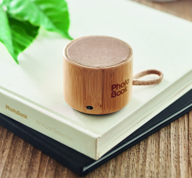 Logo trade promotional gifts picture of: Round bamboo wireless speaker